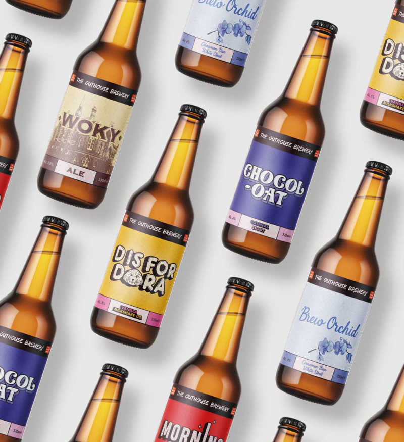 Vibrant beer label designs for The Outhouse Brewery – Featuring colorful label artwork with custom illustration and typography while maintaining consistent branding.